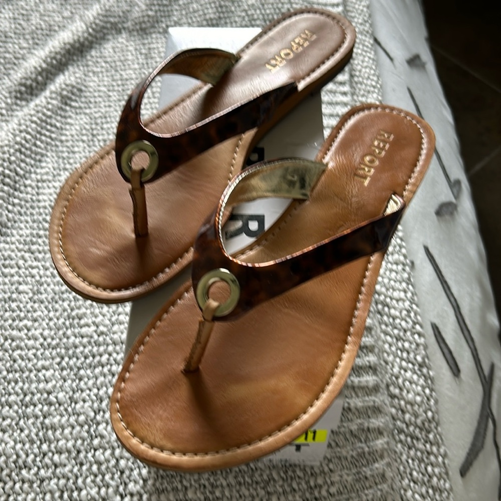 Report brand tortoise with gold hardware accent sandals